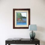 Print of an original acrylic painting of a red cabin beside a peaceful pond surrounded by nature, inspired by the tranquil beauty of Newfoundland.