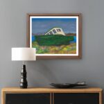 Print of an original acrylic painting of a weathered green fishing boat resting on a Newfoundland shoreline, reflecting the province's rich maritime heritage and history.
